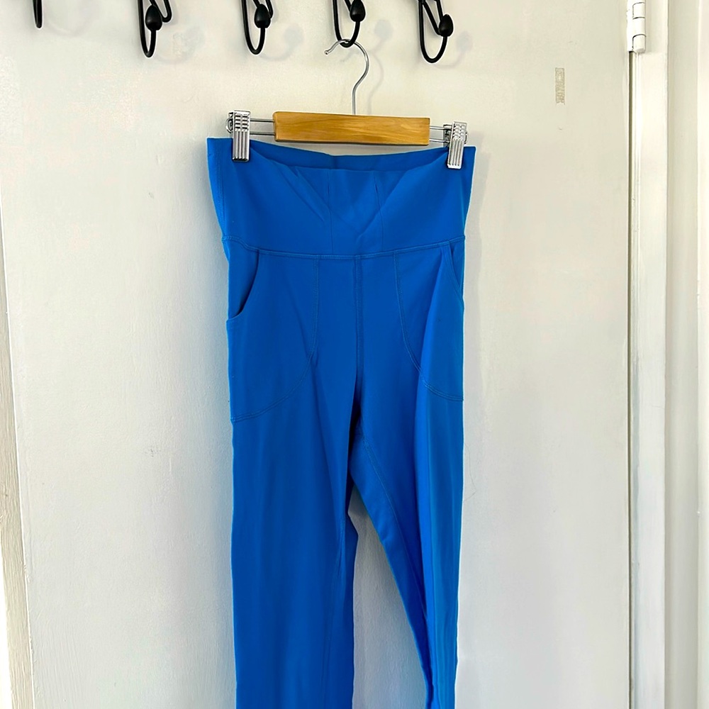 Neon blue Lulu yoga pants. Full length